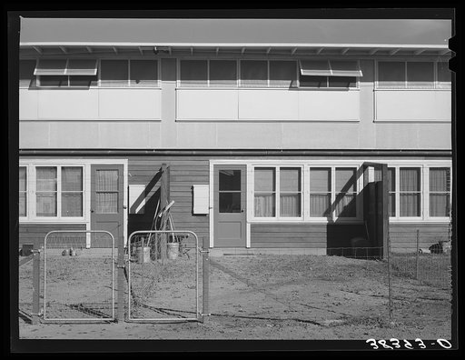Back of apartment building for permanent farm workers. Yuba City FSA (Farm Security Administration) farm workers' camp. Yuba City, California