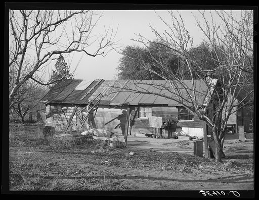 House of farmer from Oklahoma who has bought farm through the Federal Land Bank. Placer County, California. His son and daughter-in-law and their two children live in a better house on the same farm and they farm jointly
