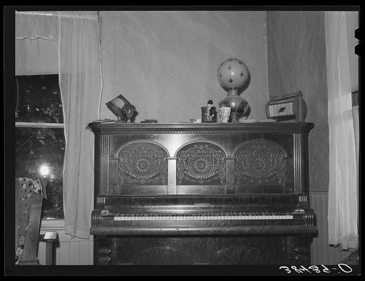 Piano in home of fruit farmer. Placer County, California