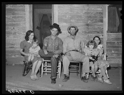 Farmer from Oklahoma, his wife, son and daughter-in-law and two grandchildren. Placer County, California. They have bought a farm through the Federal Land Bank after coming to California as migrants and picking cotton at Bakersfield. They say they like California but say their neighbors (old Califor