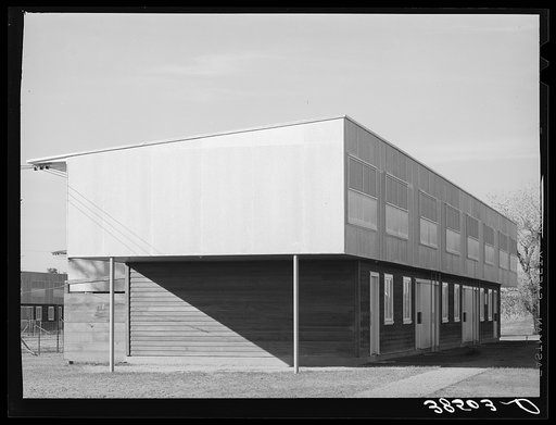 Untitled photo, possibly related to: End of apartment house for permanent farm workers at the Yuba City FSA (Farm Security Administration) farm workers' camp. Yuba City, California