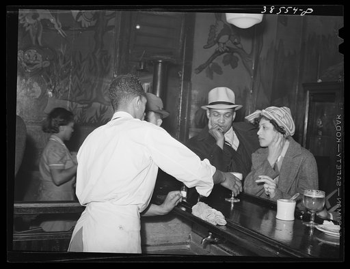 Serving to patrons of Negro tavern. Chicago, Illinois
