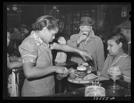 Serving beer at tavern. Southside of Chicago, Illinois