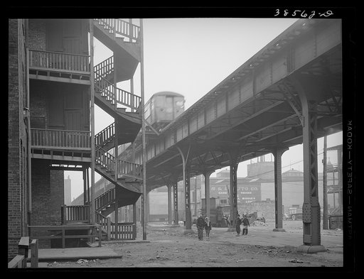 Untitled photo, possibly related to: Children playing under the elevated on the southside of Chicago, Illinois