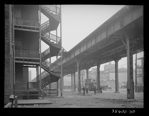 Untitled photo, possibly related to: Children playing under the elevated on the southside of Chicago, Illinois
