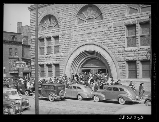 Crowd coming out of Pilgrim Baptist Church. Southside of Chicago, Illinois