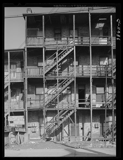 Back of apartment house rented to Negroes. Southside of Chicago, Illinois