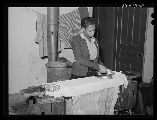 Ironing. Family on relief. Chicago, Illinois