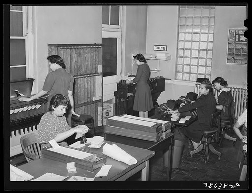 Office force of insurance company which employs Negroes and sells insurance to Negroes. Chicago, Illinois