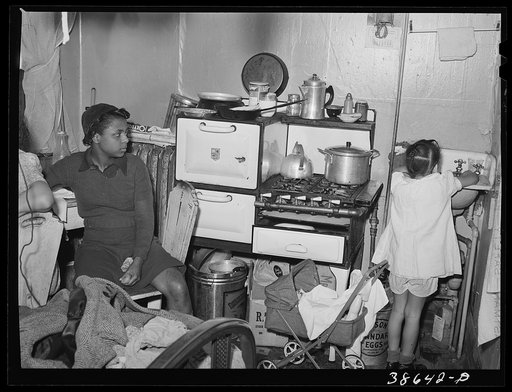 Kitchen in crowded Negro apartment. Chicago, Illinois