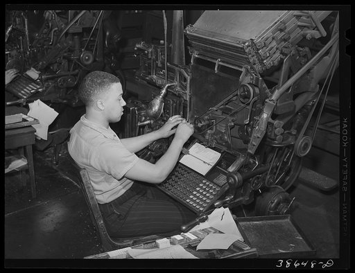 Linotype operator on the Chicago Defender, Negro newspaper. Chicago, Illinois
