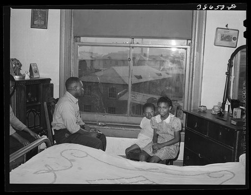 Front room of apartment rented by Negroes. Ida B. Wells Housing Project can be seen through the window. Chicago, Illinois