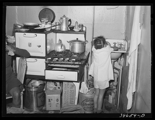 Untitled photo, possibly related to: Kitchen in crowded Negro apartment. Chicago, Illinois
