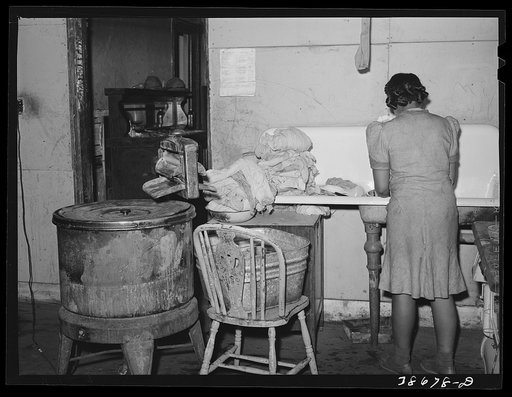 Washday of family on relief. Chicago, Illinois