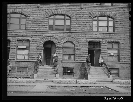 Front of apartment houses rented to Negroes. Chicago, Illinois
