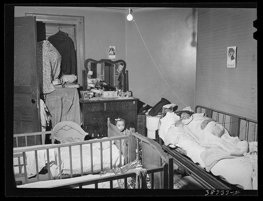 Crowded apartment of railroad worker. Chicago, Illinois