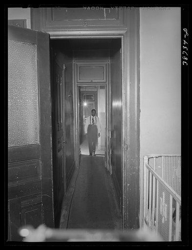 Hall leading to apartment of Negro railroad worker. Chicago, Illinois