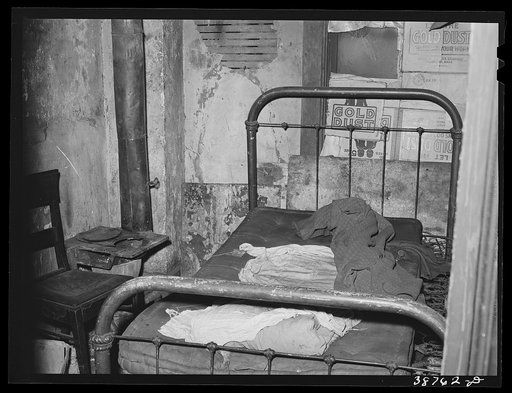 Untitled photo, possibly related to: Room in rooming house for Negroes. Chicago, Illinois