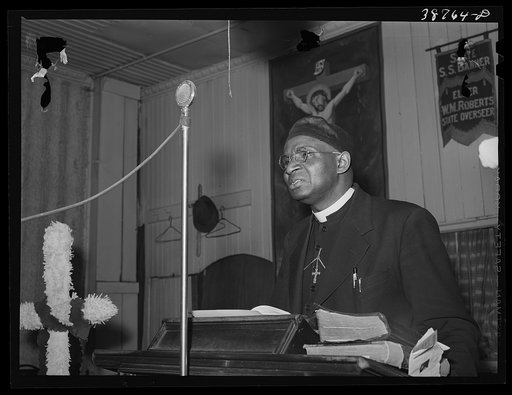 Preacher at "store front" Baptist church. Chicago, Illinois