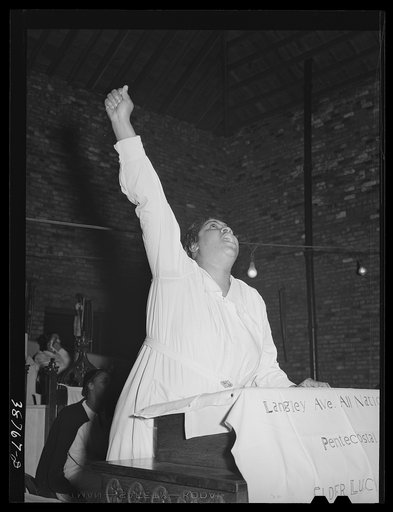 One of the leaders of the Pentecostal church testifying. Chicago, Illinois