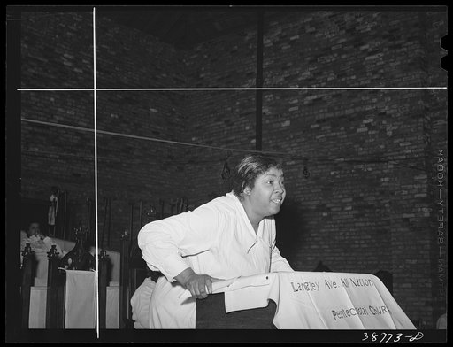 Member of the Pentecostal church testifying. Chicago, Illinois