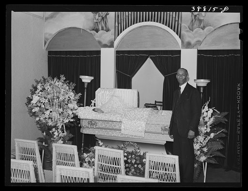 Undertaker before funeral services. Southside, Chicago, Illinois