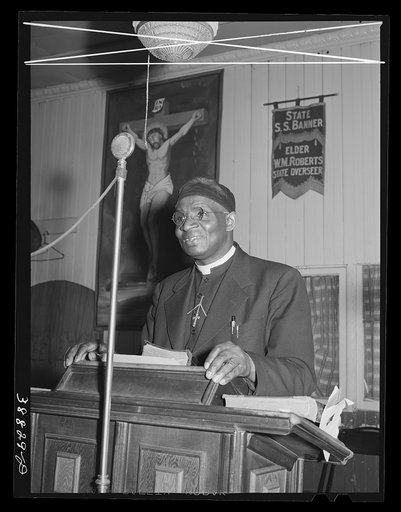 Pastor of the "storefront" Baptist church. Southside of Chicago, Illinois