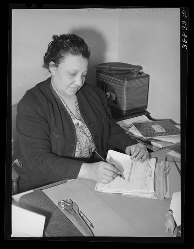 Secretary in undertaking establishment. Southside of Chicago, Illinois