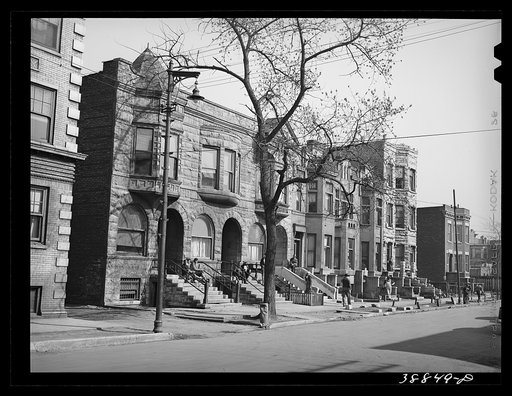 Untitled photo, possibly related to: Old brownstone houses now occupied by Negroes in Chicago, Illinois