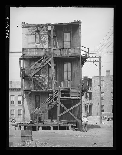 Back of multi-family dwellings rented to Negroes. Chicago, Illinois