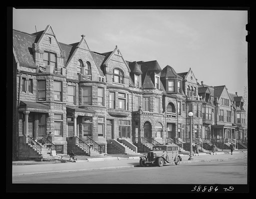 Old brownstone buildings which are now occupied by Negroes. Chicago, Illinois