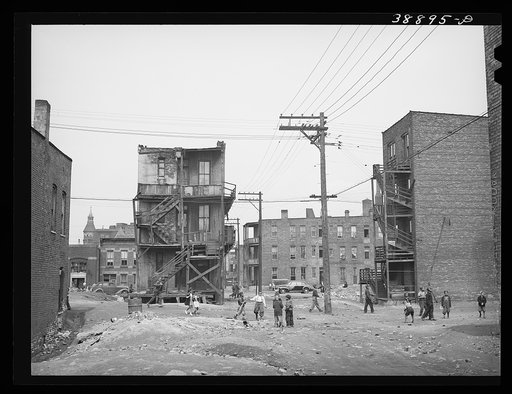 Children playing in vacant lot in Negro section of Chicago, Illinois
