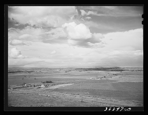 Untitled photo, possibly related to: Looking across the farmlands of the Owyhee River Valley, part of the Vale-Owyhee irrigation project. Malheur County, Oregon