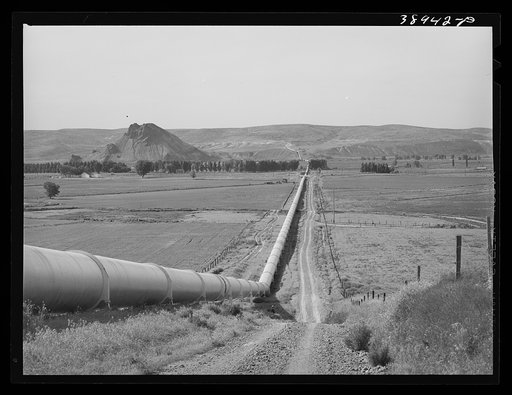 Conduit crossing the Owyhee River Valley carrying irrigation water to Dead Ox Flat from the Owyhee Reservoir. Vale-Owyhee irrigation project, Malheur County, Oregon