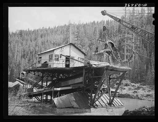 Dredging for gold and silver with doodle-bug. Baker County, Oregon