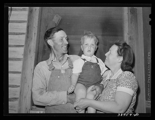 Mr. and Mrs. Schroeder and their son. He is a rehabilitation borrower living on the Vale-Owyhee irrigation project. Dead Ox Flat, Malheur County, Oregon