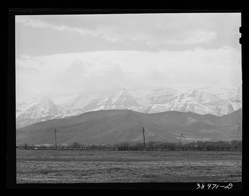Untitled photo, possibly related to: Spring pasture with the snow-covered Uinta Mountains in the background. Heber, Utah