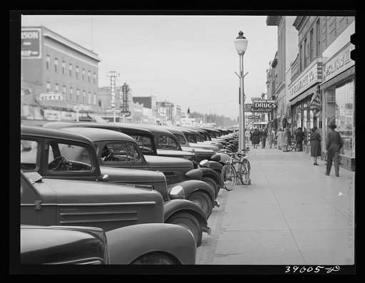 Untitled photo, possibly related to: Main street of Twin Falls, Idaho. According to Idaho State Guide (Federal Writers Project), this town had the distinction, unusual in towns in the section, of being planned