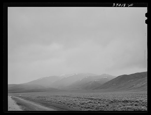 The Uinta Mountains in spring with light snows blowing in. Wasatch County, Utah