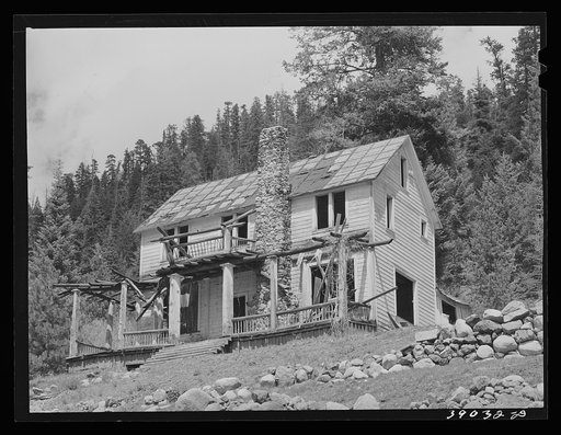 Abandoned house which was headquarters of wildcat mining organization in 1906. Bourne, Oregon