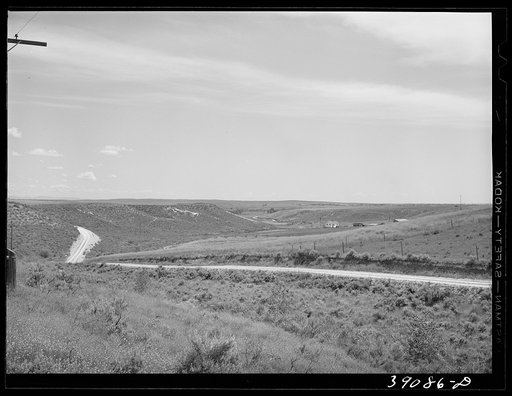 Road leading up to bench land. Vale-Owyhee irrigation project, Malheur County, Oregon. While the higher bench land is not so fertile as that in the lower valleys, it is oftimes desirable to farm the bench land because drainage of irrigation waters does not constitute a great problem