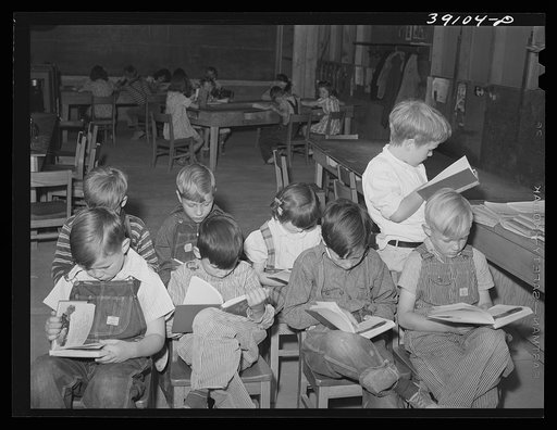 Children in school at the FSA (Farm Security Administration) farm workers' camp. Caldwell, Idaho. Caldwell did not have room in its schools for the children from the camp and Caldwell furnishes teachers and FSA furnishes schoolrooms at the camp