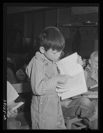 Untitled photo, possibly related to:Children in school at the FSA (Farm Security Administration) farm workers' camp. Caldwell, Idaho. Caldwell did not have room in its schools for the children from the camp and Caldwell furnishes teachers and FSA furnishes schoolrooms at the camp