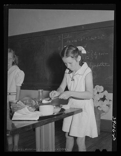 Schoolgirl demonstrating cooking methods at the 4-H Club Spring fair. Adrian, Oregon