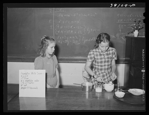 School girls demonstrating cooking methods at 4-H Club Spring fair. Adrian, Oregon