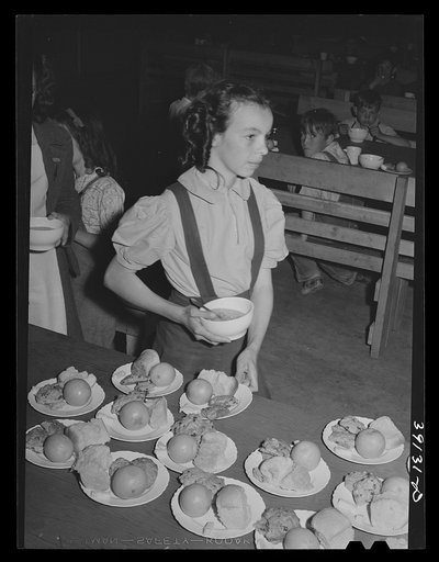 Lunch for schoolchildren, most of whose parents are working in the fields. FSA (Farm Security Administration) farm workers' camp. Caldwell, Idaho