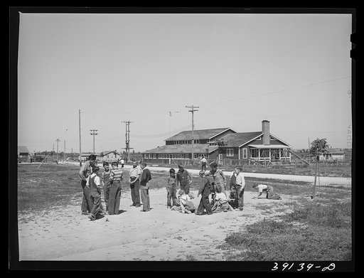 Playing during recess at the school at the FSA (Farm Security Administration) camp for farm workers. Caldewell, Idaho