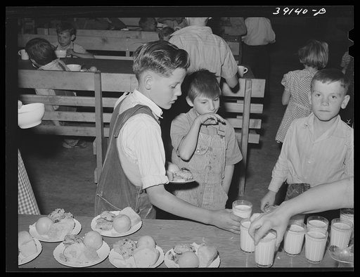 Lunch for schoolchildren at the FSA (Farm Security Administration) camp for farm workers. Caldwell, Idaho