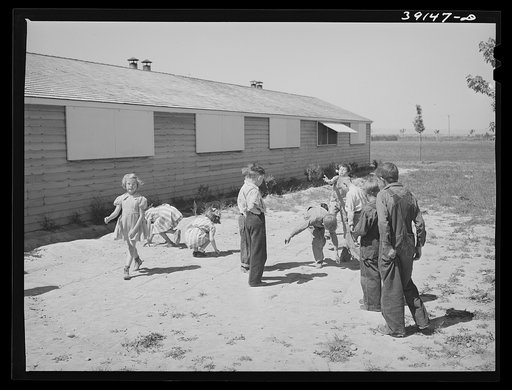 Schoolchildren playing at recess at the FSA (Farm Security Administration) farm workers' camp. Caldwell, Idaho