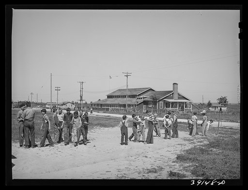 Schoolchildren playing at recess at the FSA (Farm Security Administration) farm workers' camp. Caldwell, Idaho